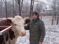 Lou_tommasso_of_the_pittenger_farm__in_his_pasture_with_new_fencing__2_